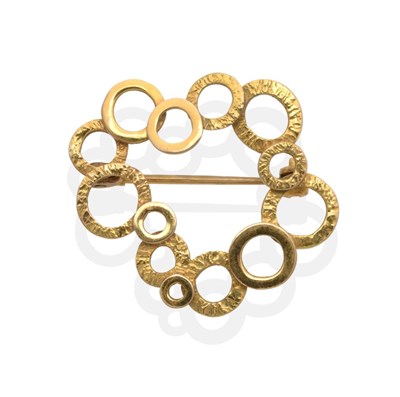 Lot 2081 - An 18 Carat Gold Abstract Brooch, formed of textured and bright polished hoops, measures 2.6cm...