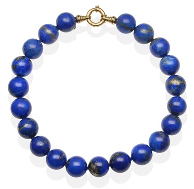 Lot 2090 - A Lapis Lazuli Necklace, round beads knotted to a bolt ring clasp, length 43.5cm see illustration