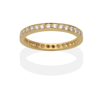 Lot 2094 - An 18 Carat Gold Diamond Eternity Ring, round brilliant cut diamonds in claw settings to a flat...