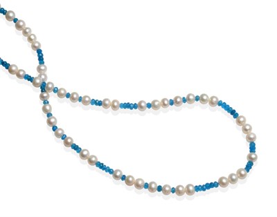 Lot 2105 - A Blue Apatite and Cultured Pearl Necklace, faceted blue apatite beads spaced at intervals by...