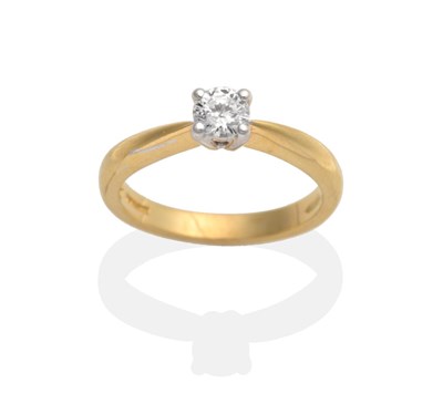 Lot 2111 - An 18 Carat Gold Diamond Solitaire Ring, a round brilliant cut diamond in a claw setting, to...