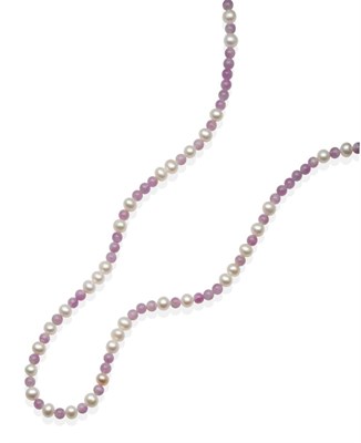 Lot 2134 - A Kunzite and Cultured Pearl Necklace, groups of round kunzite beads spaced by cultured pearls,...