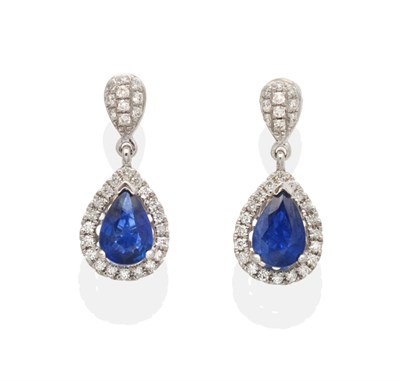 Lot 2146 - A Pair of 18 Carat White Gold Sapphire and Diamond Cluster Drop Earrings, a diamond set tear shaped