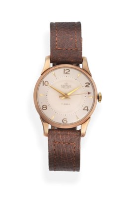 Lot 2187 - A 9ct Gold Centre Seconds Wristwatch, signed Smiths, model: Deluxe, 1957, (calibre 27CS) lever...