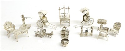 Lot 2279 - A Group of Continental Silver Toys, most with English import marks, 1894-1906, comprising: a...