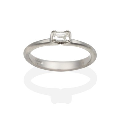 Lot 2017 - A Platinum Solitaire Diamond Ring, an octagonal cut diamond in a half rubbed over setting,...