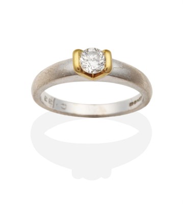 Lot 2021 - An 18 Carat White Diamond Solitaire Diamond Ring, a round brilliant cut diamond in a yellow...