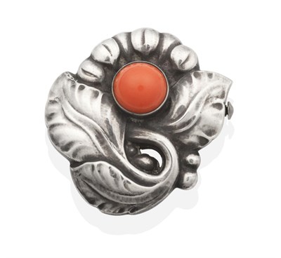 Lot 2030 - A Georg Jensen Coral Brooch, model number 71, of foliate design with a coral cabochon, measures 3cm