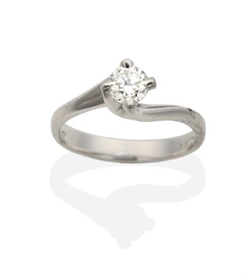 Lot 2040 - A Platinum Solitaire Diamond Ring, a round brilliant cut diamond in a bypass setting, estimated...