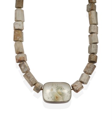 Lot 2046 - A Rock Crystal Necklace, by Barbara Christie, a cabochon rock crystal plaque in a rubbed over...