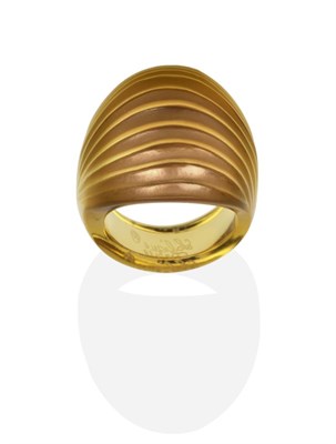 Lot 2051 - A Moulded Brown Glass Ring, by Lalique, as a ribbed dome, finger size N, the top measures 2.2cm...