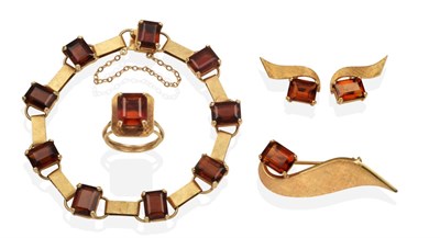 Lot 2064 - A Citrine Suite, comprising a ring, bracelet, earrings and a brooch, each with octagonal cut...