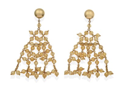 Lot 2067 - A Pair of Citrine Pendant Earrings, a yellow domed stud suspends a tassel drop of faceted...