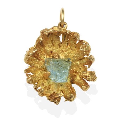 Lot 2079 - An Aquamarine Pendant, a rough aquamarine in a claw setting to a heavily textured petal...