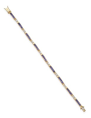 Lot 2083 - An 18 Carat Gold Sapphire and Diamond Line Bracelet, bar links of channel set calibré cut...