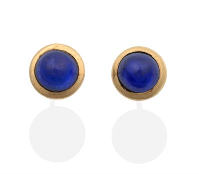 Lot 2097 - A Pair of Sapphire Stud Earrings, round cabochon sapphires in rubbed over settings, measure 8mm...