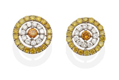 Lot 2110 - A Pair of Coloured Diamond Earrings, an orange round brilliant cut diamond within a frame of...