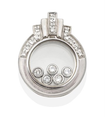 Lot 2126 - A 'Floating' Diamond Pendant, a circular pendant inset with round brilliant cut diamonds to an...