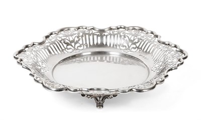 Lot 2214 - A Shaped Circular Pierced Silver Dish, Fattorini & Sons, Birmingham 1942, raised on four...