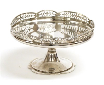 Lot 2216 - A Circular Silver Dish, Mappin & Webb, London 1942, with foliate pierced shaped rim, on...