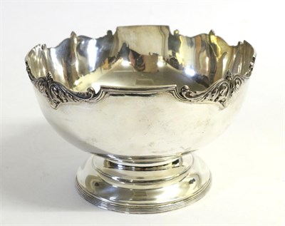 Lot 2227 - A George V Silver Pedestal Bowl, Mappin & Webb, Sheffield 1921, the shaped rim with foliate and...