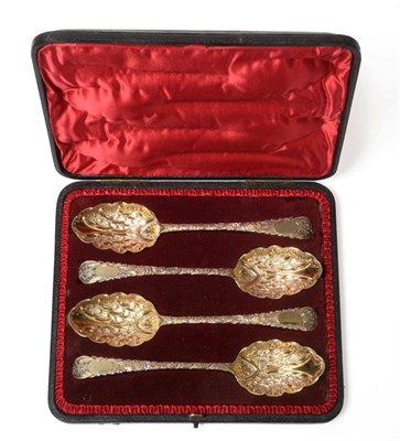 Lot 2232 - A Set of Four Victorian Silver-Gilt Berry Spoons, maker's mark TL probably overstriking...