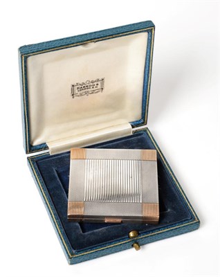 Lot 2261 - An Art Deco Parcel-Gilt Silver Powder Compact, Harrods Ltd (Richard Burbidge), London 1936,...