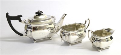 Lot 2274 - A Three Piece Silver Tea Service, Edward Barnard & Sons Ltd London 1918, shaped oval with...