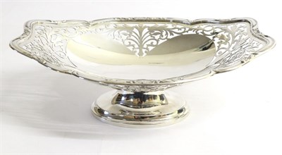 Lot 2277 - A Pierced Silver Pedestal Bowl, Henry Wigfull, Sheffield, 1944, shaped oval with foliate...