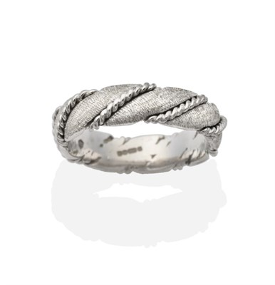 Lot 2024 - An 18 Carat White Gold Textured Twist Band Ring, by Jack Spencer, finger size M see illustration