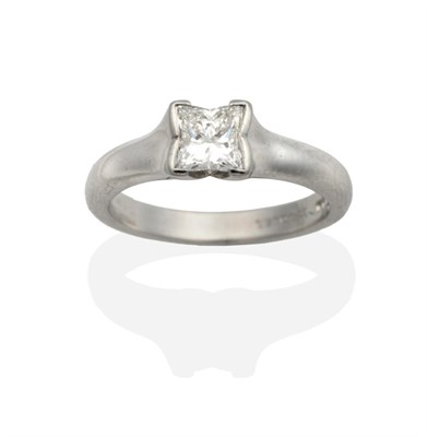 Lot 2029 - A Platinum Modified Princess Cut Solitaire Diamond Ring, by Boodles, in a rubbed over setting...