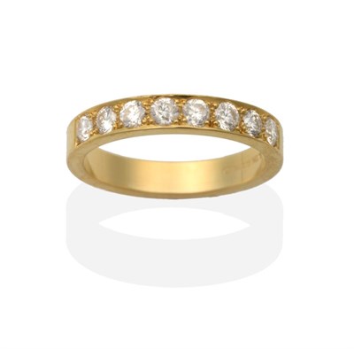 Lot 2053 - An 18 Carat Gold Diamond Half Hoop Ring, eight round brilliant cut diamonds inset to a flat...