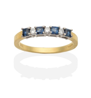 Lot 2058 - An 18 Carat Gold Sapphire and Diamond Half Hoop Ring, square cut sapphires in claw settings, spaced