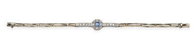 Lot 2062 - A Sapphire and Diamond Bracelet, a square cut sapphire in a milgrain setting, to an eight-cut...