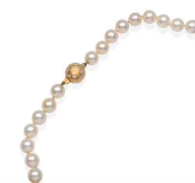 Lot 2068 - A Cultured Pearl Necklace, with an 18 Carat Gold Diamond Set Clasp, a single strand of uniform...