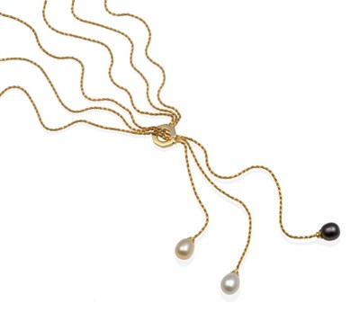 Lot 2069 - A Cultured Pearl Pendant Necklace, two white and one black cultured drop pearls suspended from rope