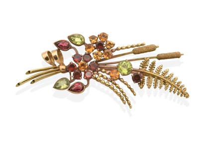 Lot 2074 - A Multi-Gemstone Set Spray Brooch, by Alabaster & Wilson, a floral spray of flowers, ferns and...