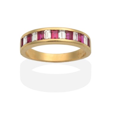 Lot 2075 - An 18 Carat Gold Ruby and Diamond Half Hoop Ring, channel set with alternating baguette cut...