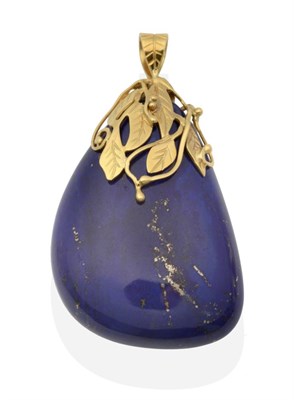 Lot 2088 - An 18 Carat Gold Lapis Lazuli Pendant, a lapis lazuli drop to a vine motif bail, measures 6.5cm...