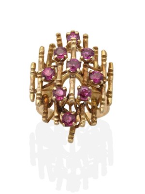 Lot 2098 - A Ruby Cluster Ring, round cut rubies in claw settings, to a cluster of bamboo motif bars,...