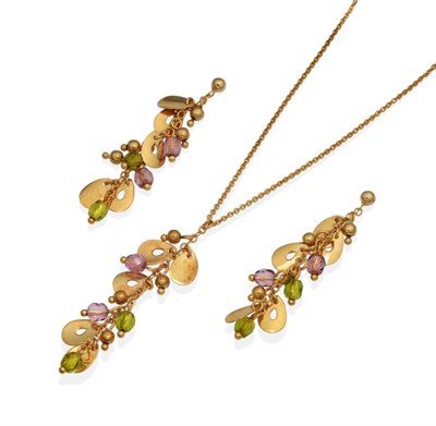 Lot 2102 - A 9 Carat Gold Amethyst and Peridot Necklace and Earring Suite, a tassel drop of faceted...