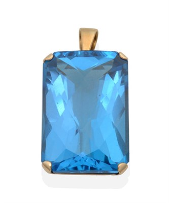 Lot 2119 - A 9 Carat Gold Blue Topaz Pendant, a checkerboard octagonal cut blue topaz in a claw setting, topaz