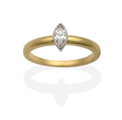 Lot 2123 - An 18 Carat Gold Marquise Cut Solitaire Diamond Ring, in a rubbed over setting, to straight...