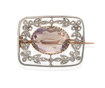 Lot 2130 - An Early Twentieth Century Ametrine and Diamond Brooch, an oval cut ametrine in a collet...