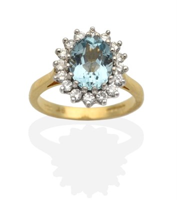 Lot 2141 - An 18 Carat Gold Aquamarine and Diamond Cluster Ring, an oval cut aquamarine in a claw setting,...