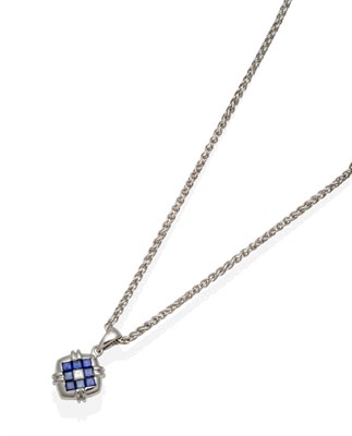 Lot 2144 - An 18 Carat White Gold Sapphire and Diamond Pendant on Chain, a princess cut diamond within a...