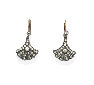 Lot 2159 - A Pair of Art Deco Diamond Earrings, an old cut diamond in a milgrain setting suspends a fan-shaped