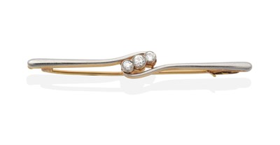 Lot 2166 - A Diamond Bar Brooch, three graduated old cut diamonds, in milgrain settings, to a tapering...