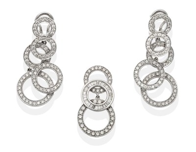 Lot 2176 - A Diamond Earring and Pendant Suite, the earrings formed of graduated articulated hoops,...