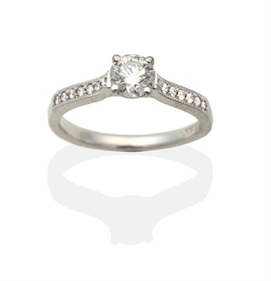 Lot 2185 - An 18 Carat White Gold Solitaire Diamond Ring, a round brilliant cut diamond in a claw setting...